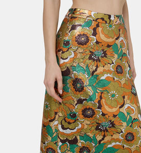 تنورة متوسطة الطول مزينة بترتر بأزهار