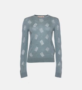 كنزة محبوكة بياقة دائرية وتفاصيل مثقبة