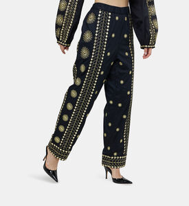 بنطال بخصر عالٍ مطرز بشكل شمس