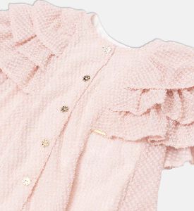 فستان بأكمام كاب مكشكشة متدرجة وأزرار أمامية