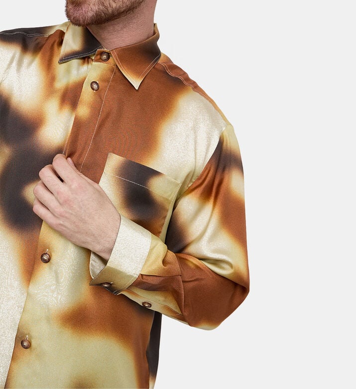 قميص سيباس ملطخ بنقشة غرافيتي فضفاض قميص سيباس ملطخ بنقشة غرافيتي فضفاض