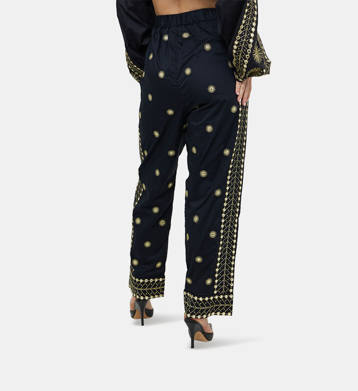 بنطال بخصر عالٍ مطرز بشكل شمس