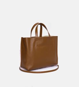 حقيبة مغطاة بفرو بمقبض علوي