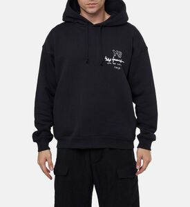 هودي فضفاض مضلع بطبعة شعار