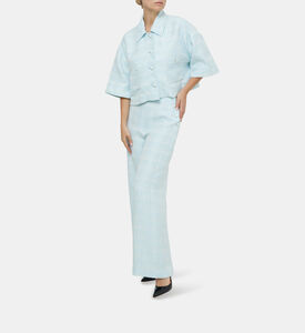 بنطال مزين بأزرار بأرجل عريضة