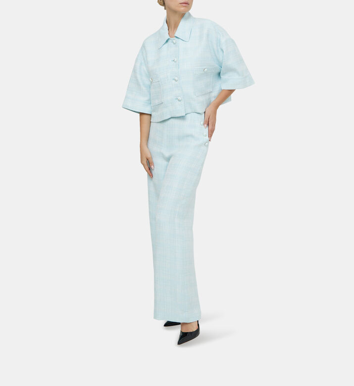 بنطال مزين بأزرار بأرجل عريضة