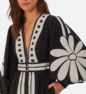 فستان طويل بنقوش الطبيعة