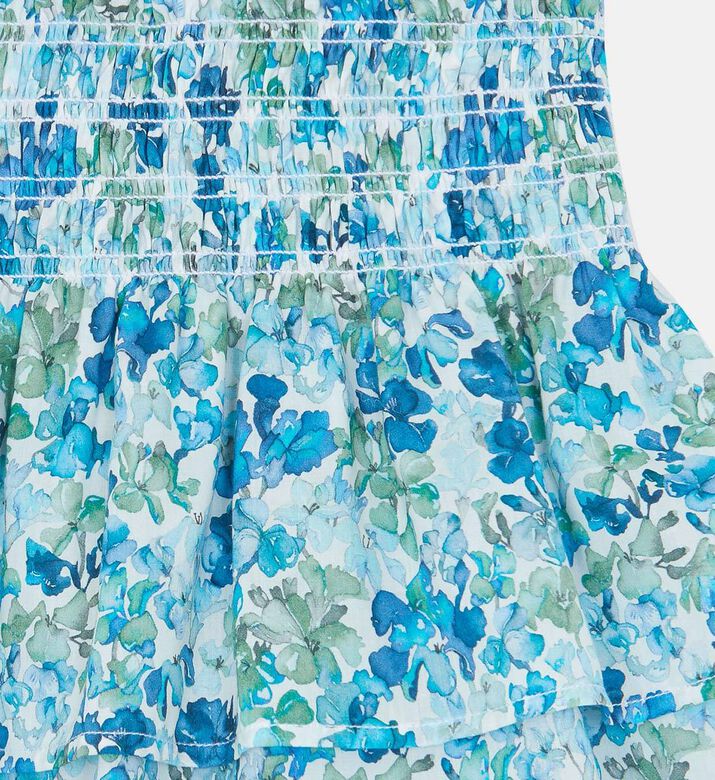 تنورة قصيرة بنقشة زرقاء بقماش ليبرتي بطبعة أزهار