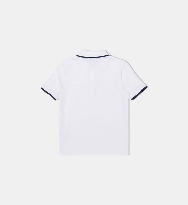 قميص بولو مطرز بشعار مزين بحواف متباينة قميص بولو مطرز بشعار مزين بحواف متباينة