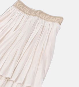 تنورة متوسطة الطول بطيات بطبعة شعار