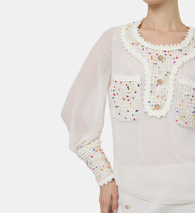 بلوزة بأكمام طويلة بتقليمات تويد