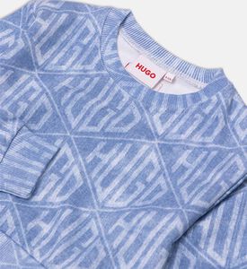 سويت شيرت فضفاض بقصّة واسعة وشعار هندسي بتأثير دنيم