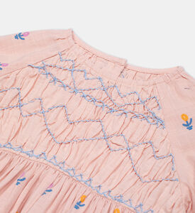 فستان بأكمام طويلة مطرز بأزهار