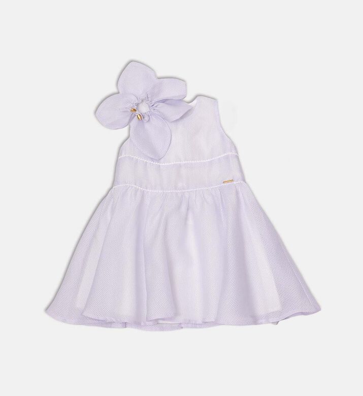 فستان بقصّة هرمية مزين بزخرفة زهرية