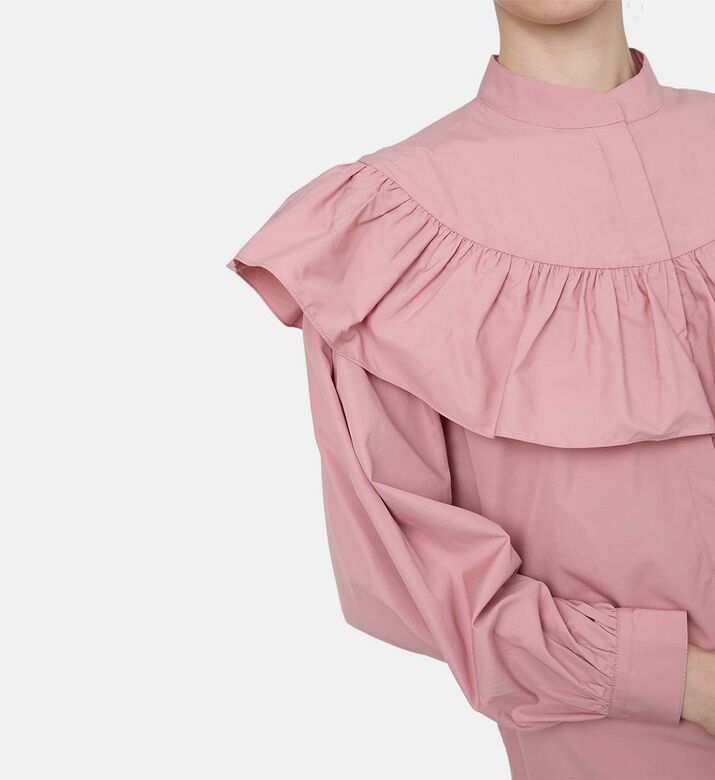 بلوزة بأكمام طويلة بياقة مكشكشة