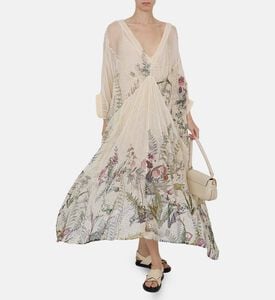 فستان طويل بأكمام واسعة بطبعة أزهار