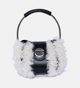 الحقيبة الدائرية المزخرفة من جلد العجل