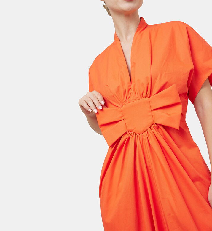 فستان سيركا منسدل باللون البرتقالي فستان سيركا منسدل باللون البرتقالي