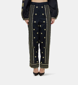 بنطال بخصر عالٍ مطرز بشكل شمس