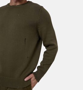 سترة محبوكة طويلة الأكمام ومثقبة