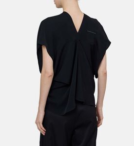 بلوزة واسعة بأكمام قصيرة وياقة في