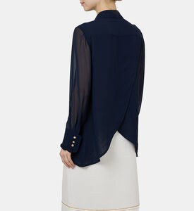 بلوزة بأكمام طويلة بعقدة