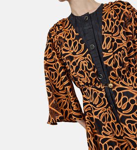 فستان متوسط الطول واسع بياقة في بطبعة تجريدية