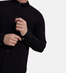 قميص طويل الأكمام بتطريز شعار