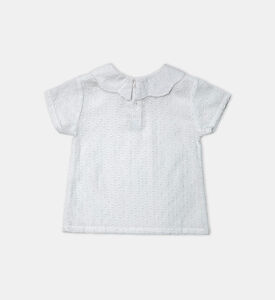 بلوزة بطبعة بلوميتيس