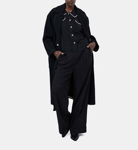 بلوزة بأكمام شفافة مطرزة بلؤلؤ