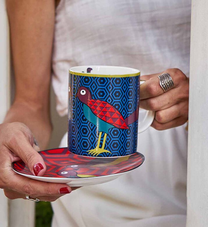 علبة قصدير مج طيور الجنة