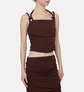 بلوزة مجمعة بأشرطة مزينة بعقد