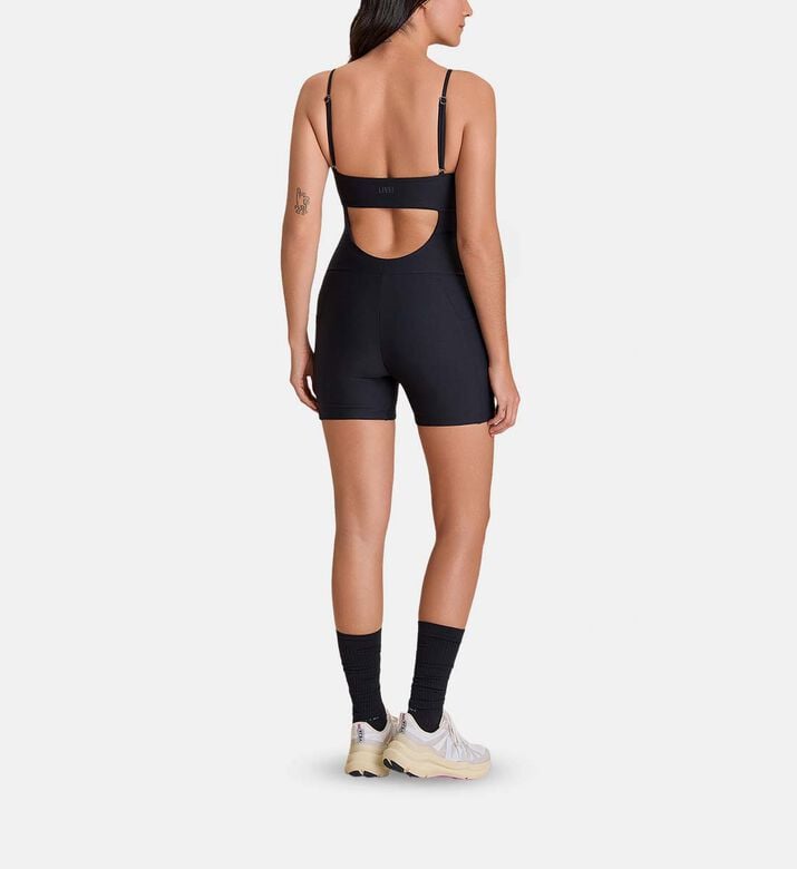 LIVE! Horizontal Cut-out Mid-thigh Jumpsuit, Model View LIVE! Horizontal Cut-out Mid-thigh Jumpsuit, Model View