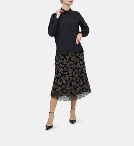 قميص فضفاض بأزرار وطيات خلفية