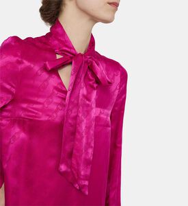 فستان بحافة مكشكشة بربطة أمامية