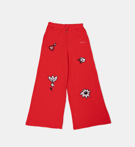 بنطال واسع الساقين مزين بأزهار من الترتر