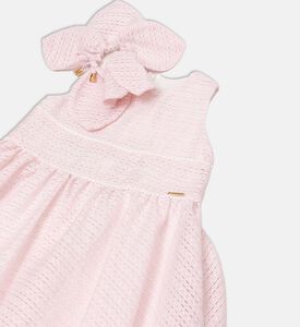 فستان هرمي بنسيج محبوك بنقشة وتفصيل عقدة