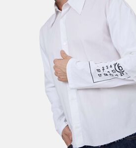 قميص قطن بأكمام طويلة وشعار على الكم