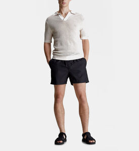 تيشيرت بولو شاطئي محبوك بنقشة مفرغة