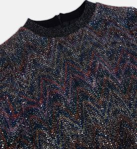 بلوزة طويلة الأكمام مزينة بترتر