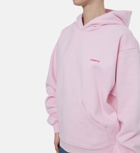 هودي بقصّة فضفاضة وشعار مطبوع على الصدر