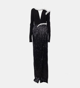 فستان بقصّة ضيّقة مزين بتطريز ثعبان وتنورة بشراشيب