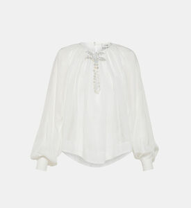 قميص مطرز بأكمام منفوخة