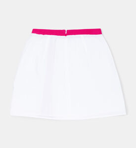 تنورة قصيرة بأزرار مثلثة مطبوعة