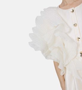 فستان واسع بأكمام مكشكشة