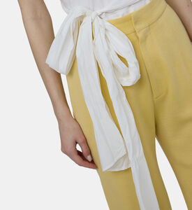 بلوزة بدون أكمام بحزام