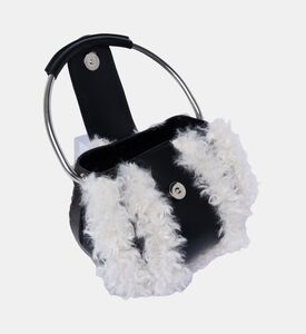 الحقيبة الدائرية المزخرفة من جلد العجل