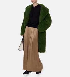 سترة بأكمام منفوشة وفتحة أزرار