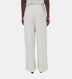 بنطال بثنيات عريض الساقين