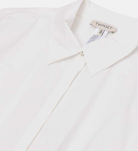 قميص قصير بأكمام طويلة منفوخة